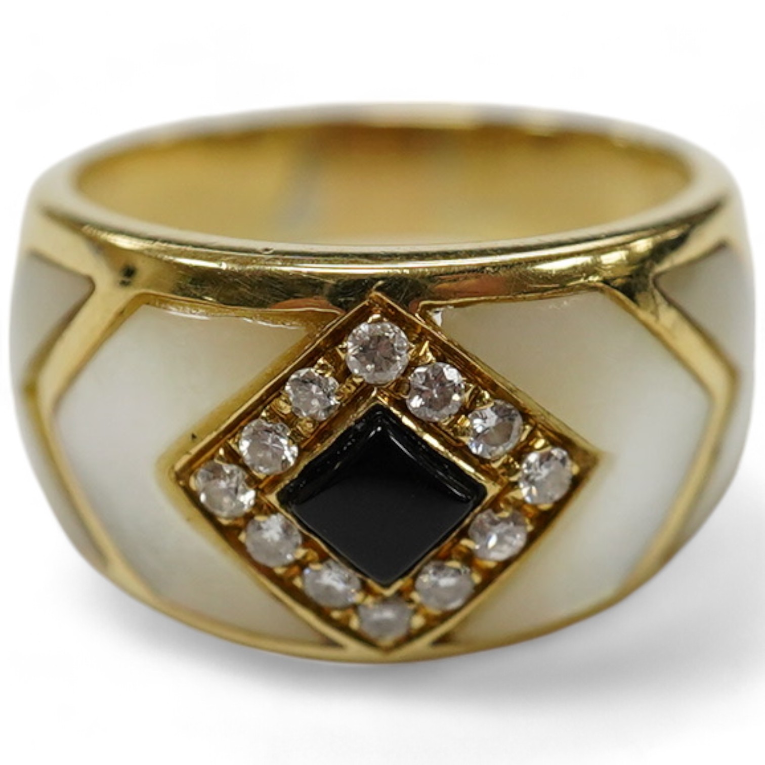 An Italian? yellow metal, mother of pearl, black enamel and diamond cluster set dress ring, size Q, gross weight 8.3 grams. Condition - fair